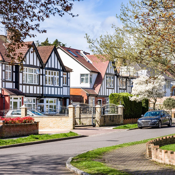 Tudor-style,Semi-detached,Houses,On,A,Suburban,Street,In,Hatch,End,